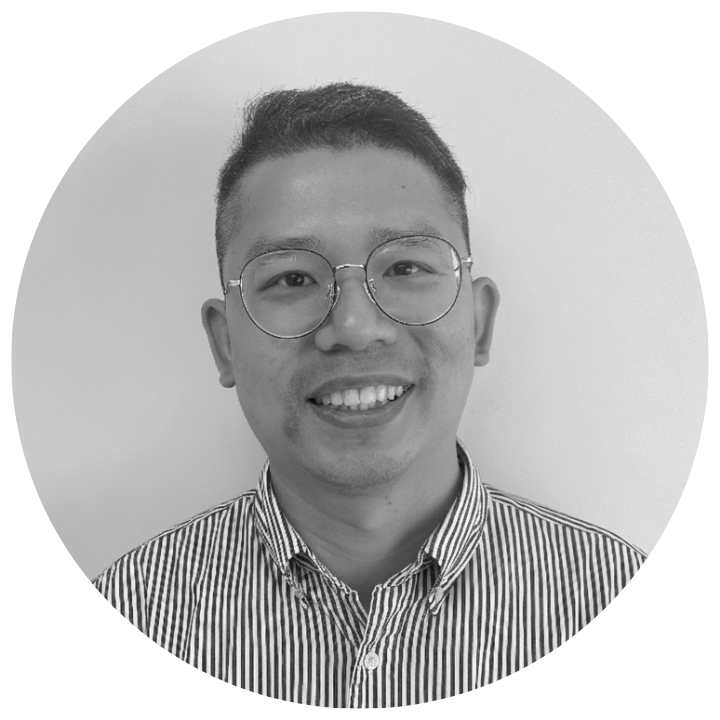 Black and white circular portrait of a person wearing glasses and a striped shirt. Tony Jung - Head of Technology at Moggie Cat Tracker